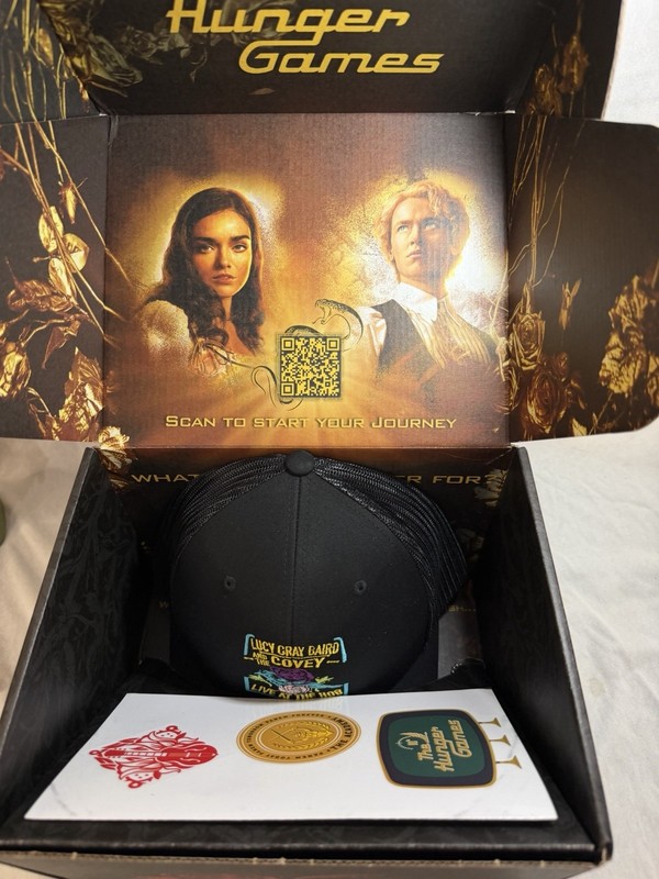 The Hunger Games Hat Exclusive Merchandise - Box, Hat, Dog tag & Stickers Only gallery