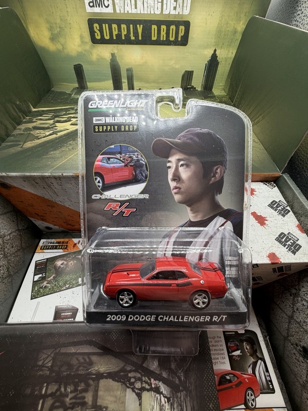 AMC TWD The Walking Dead Supply Drop Box 2021 Gold Rick Grimes #13 Challenger gallery